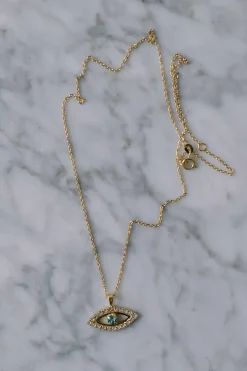Greek Eye Necklace Gold Crystal/Aquamarine^CAROLINE SVEDBOM New