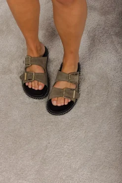 Mary Sandals Stone^JIM RICKEY New